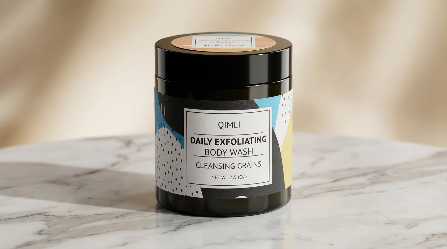 Qimli Daily Exfoliating Body Wash jar on a marble surface with a beige background